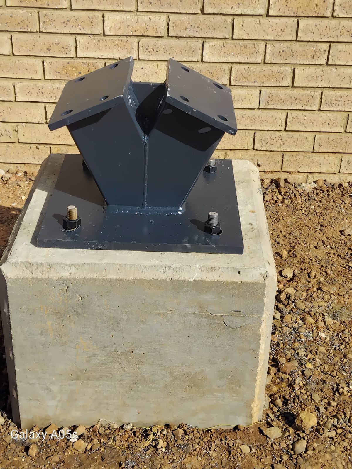 NWU Writing Centre — Mafikeng — Custom steel bracketry on concrete plinth