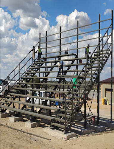 Logageng Sports Facility — Seating frame & walkway framing underway