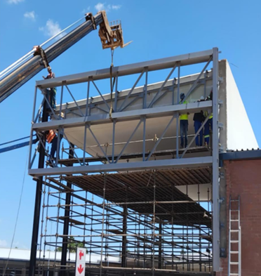 Village Mall Klerksdorp — Canopy steelwork being craned onto columns