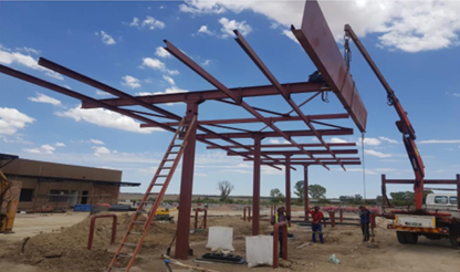 Puma Garage — Stella — Cantilever canopy beams craned into place