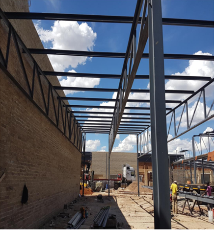 Station Road Complex — Mafikeng — Roof beam & lattice truss array — interior view