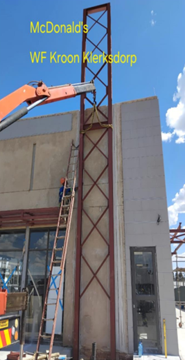 Village Mall Klerksdorp — McDonald's signage tower — installation in progress