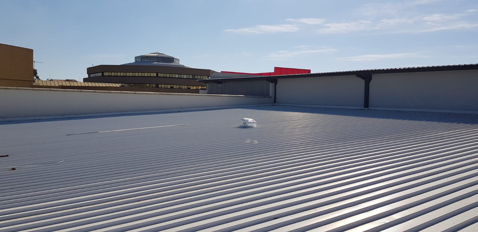 Mega City Mall — Mafikeng — New IBR roof sheeting — rooftop view across the mall