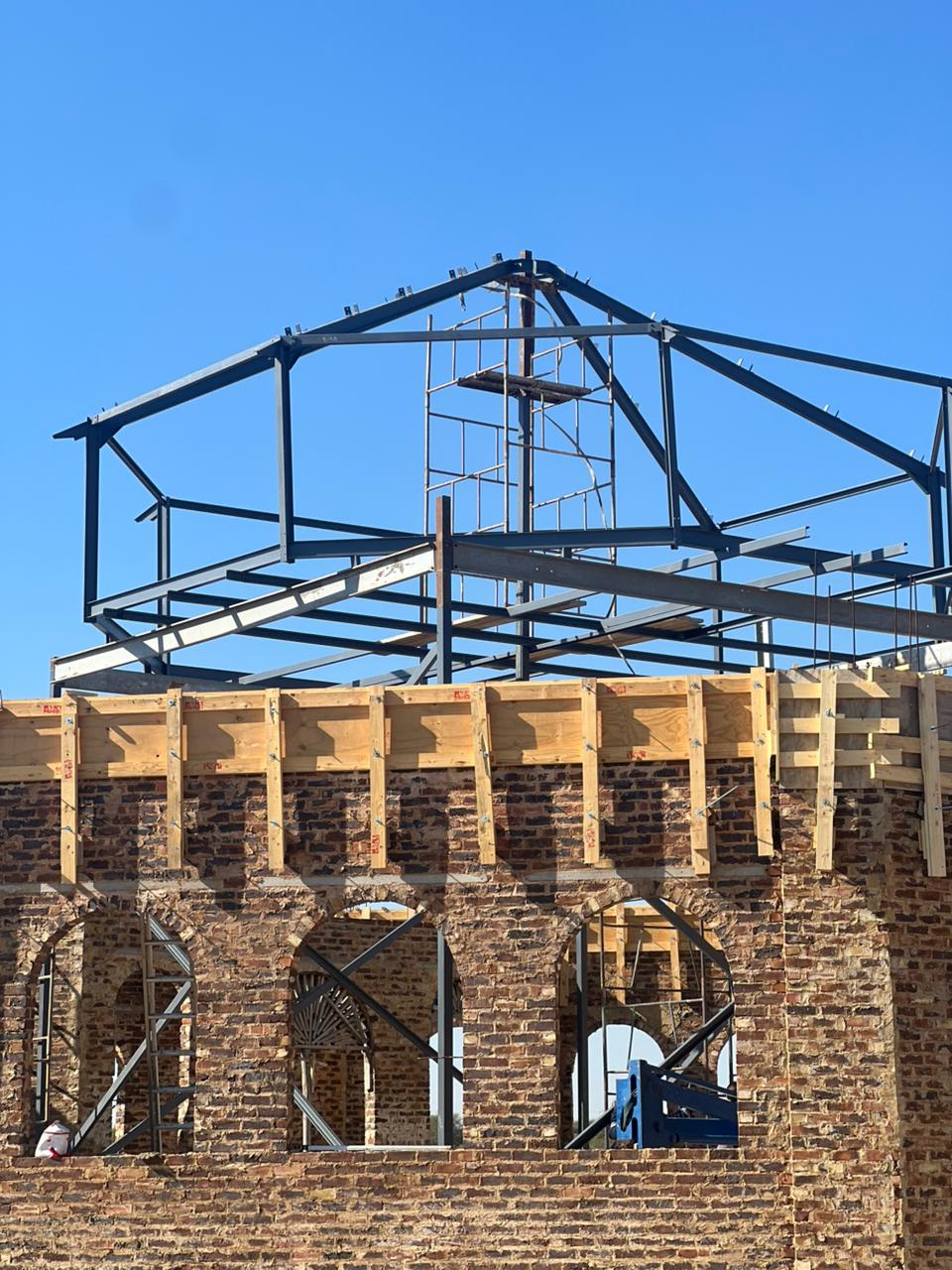 Saint Gabriel Church — Lantern frame & faceted rafters viewed from inside the chapel